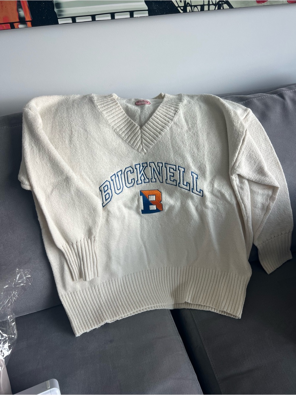 Ivory V‑Neck Sweater with Embroidered Bucknell Logo
